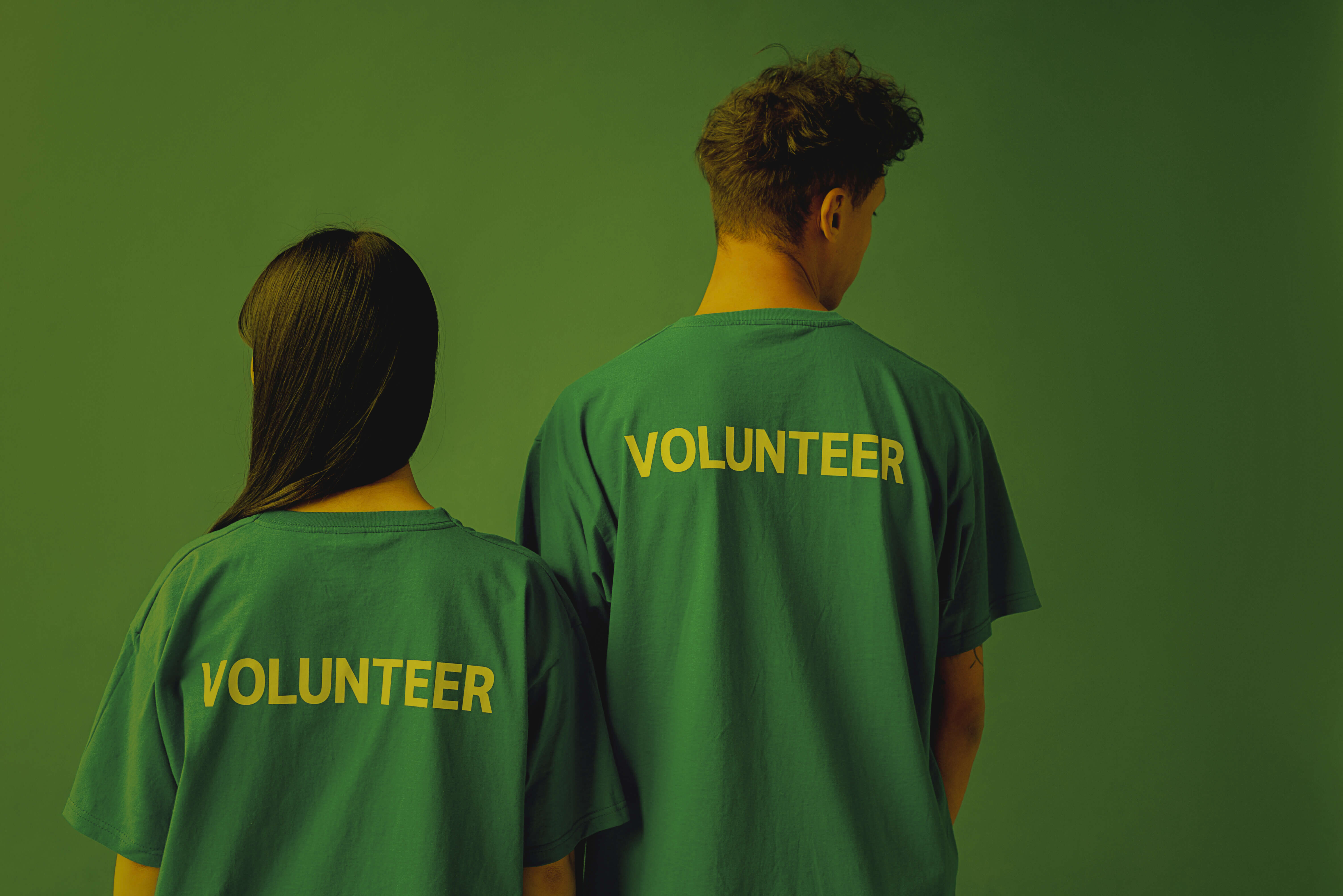A team of diverse volunteers smiling